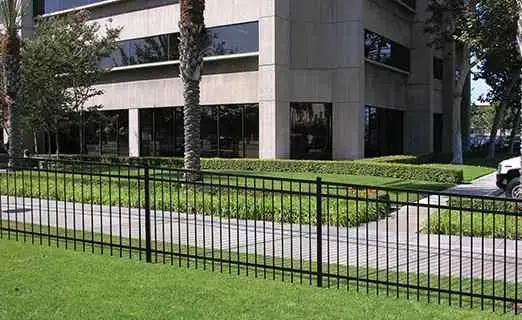 Black aluminum fence installed around a Dallas front yard